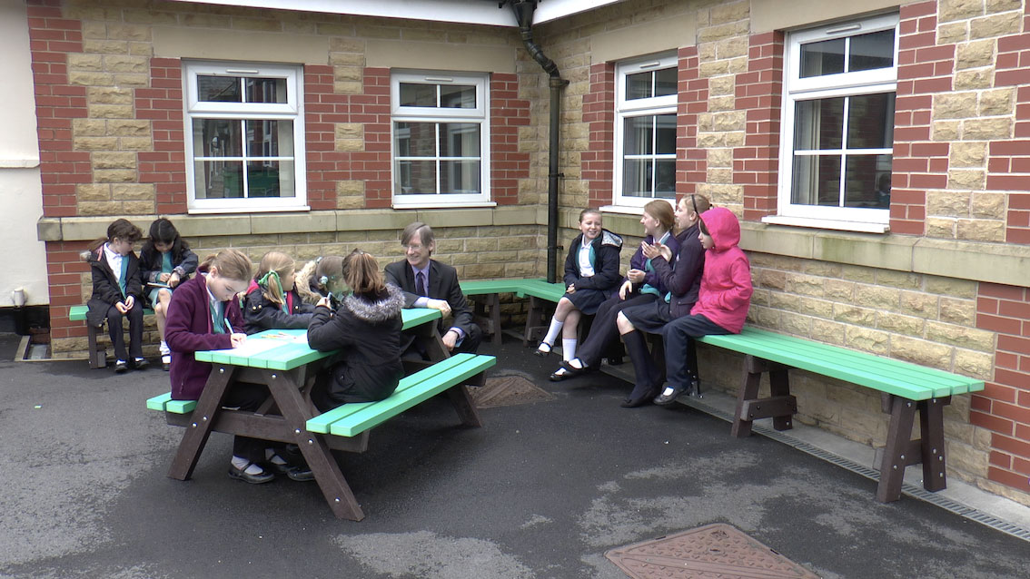 Turton Belmont Community Primary School playground after refurbishment with recycled plastic seating